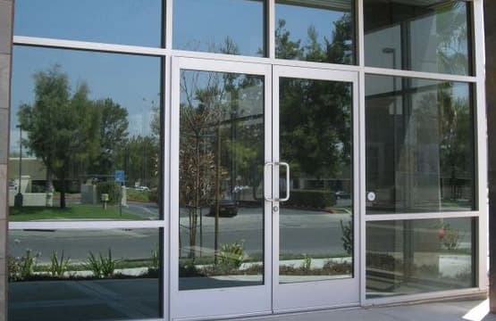 Damaged storefront glass door